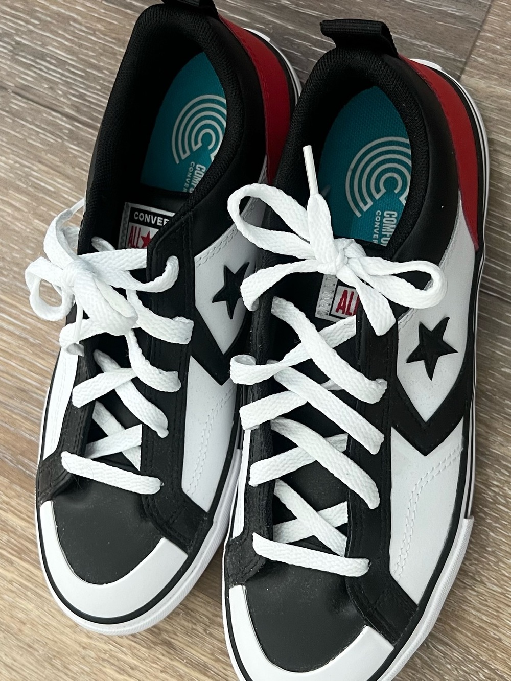 Converse Star Player Low Top Sneakers in Black/White/Red